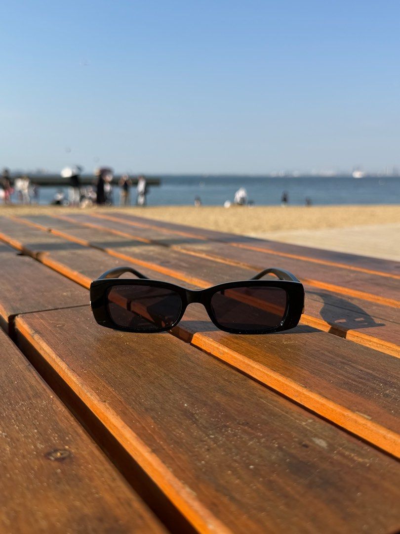 Balenciaga BB Logo Sunglasses Black (Category: Sunglasses & Eyewear) located in Manila. Submitted by urbanglasses.mnl (Listing ID 1442913216, Image 2). Description: - Features Gold BB Logo on Sides - Made in Italy - Rectangular Frame Shape - Ideal for Sunny Days - Versatile Accessory for Any Outfit.