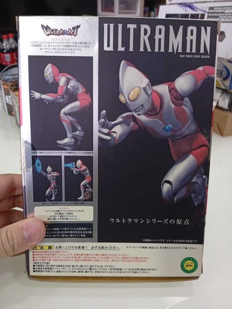 Bandai Ultra-Act Ultraman action figure, featuring red and silver coloring and a blue color timer on its chest (Category: Toy Figures) located in Singapore. Submitted by maxmaxboi (Listing ID 1442765173, Image 2). Description: - Bandai Ultra-Act Ultraman action figure, featuring red and silver coloring and a blue color timer on its chest - Box shows minor wear on edges - Comes with accessories for various poses - Ideal collectible for Ultraman fa