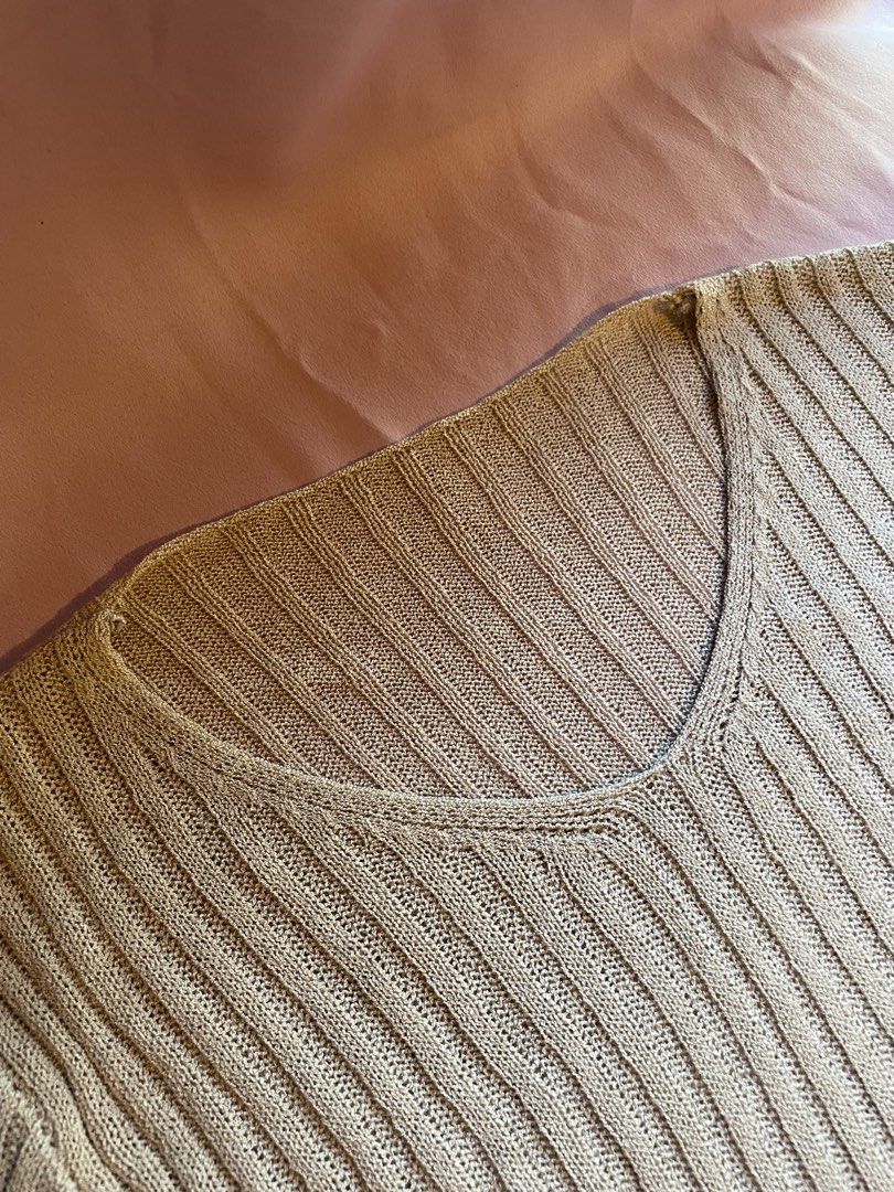 Beige Ribbed Knit Long Sleeve Crop Top (Category: Longsleeves) located in Pasig City. Submitted by rel.iques (Listing ID 1442856567, Image 2). Description: A flattering and cozy knit top with a subtle semi-sheer texture, perfect for effortless everyday styling. ✨ Soft ribbed knit fabric✨ Long sleeves with a comfortable stretch fit✨ V-neck design for a flattering silhouette✨ Slightly sheer when worn while still providing coverage✨ Easy to pair wit