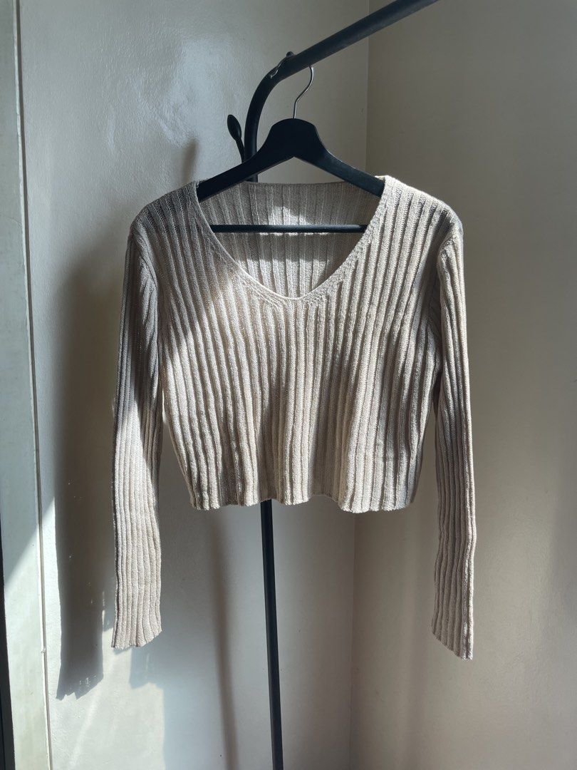 Beige Ribbed Knit Long Sleeve Crop Top (Category: Longsleeves) located in Pasig City. Submitted by rel.iques (Listing ID 1442856567, Image 1). Description: A flattering and cozy knit top with a subtle semi-sheer texture, perfect for effortless everyday styling. ✨ Soft ribbed knit fabric✨ Long sleeves with a comfortable stretch fit✨ V-neck design for a flattering silhouette✨ Slightly sheer when worn while still providing coverage✨ Easy to pair wit