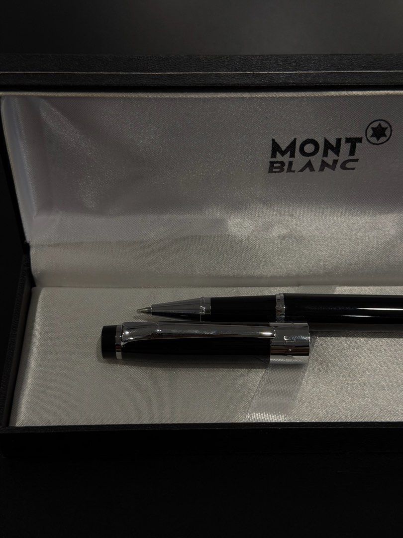 Black Mont Blanc Rollerball Pen with Box and Refills (Category: Luxury Accessories) located in Manila. Submitted by andwweee (Listing ID 1442885813, Image 2). Description: - Mirror copy Mont Blanc Rollerball Pen - Elegant classic black design with silver accents - Comes with original Mont Blanc presentation box - Includes extra ink refills for continuous use - Delivers a smooth and effortless writing experience - Ideal for everyday writing or as 