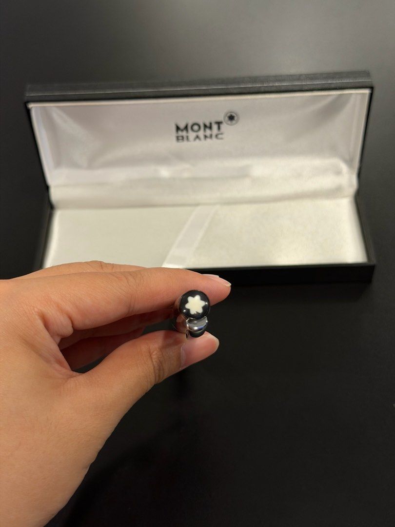 Black Mont Blanc Rollerball Pen with Box and Refills (Category: Luxury Accessories) located in Manila. Submitted by andwweee (Listing ID 1442885813, Image 3). Description: - Mirror copy Mont Blanc Rollerball Pen - Elegant classic black design with silver accents - Comes with original Mont Blanc presentation box - Includes extra ink refills for continuous use - Delivers a smooth and effortless writing experience - Ideal for everyday writing or as 