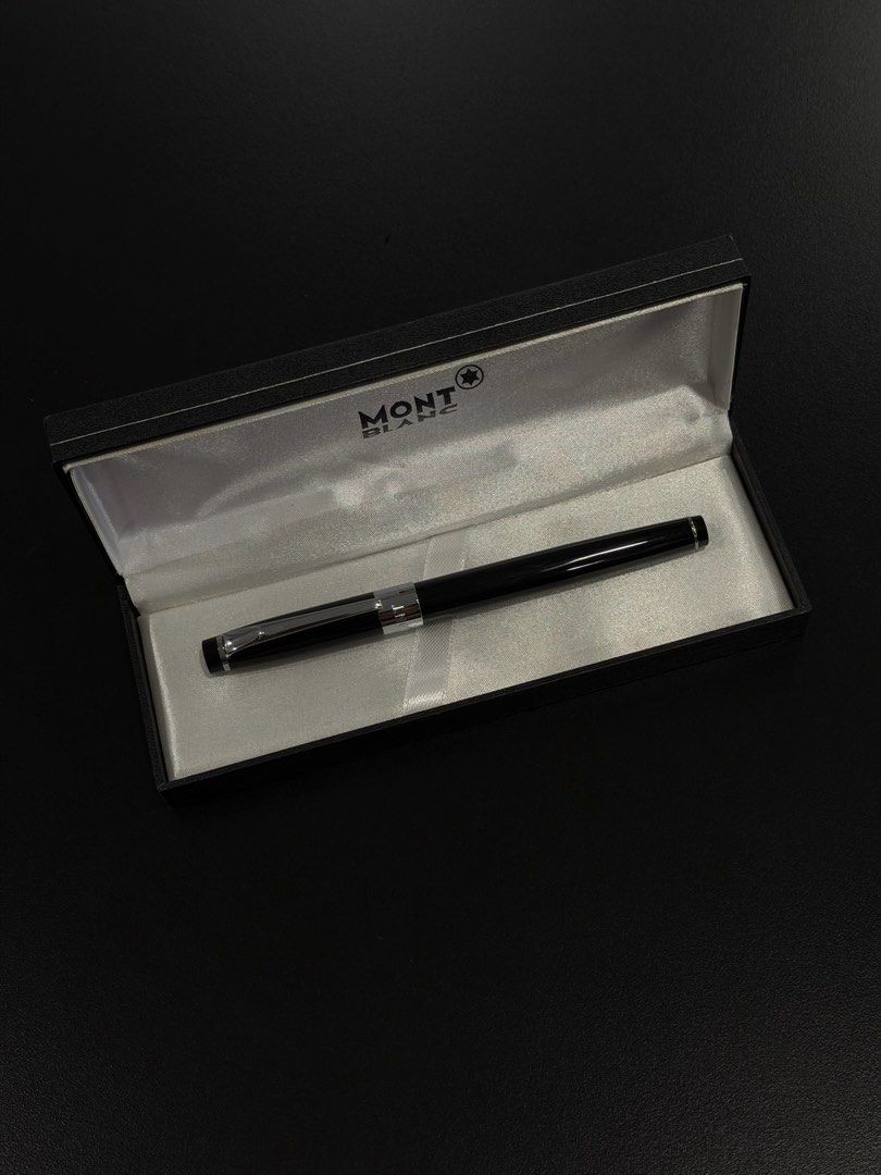 Black Mont Blanc Rollerball Pen with Box and Refills (Category: Luxury Accessories) located in Manila. Submitted by andwweee (Listing ID 1442885813, Image 1). Description: - Mirror copy Mont Blanc Rollerball Pen - Elegant classic black design with silver accents - Comes with original Mont Blanc presentation box - Includes extra ink refills for continuous use - Delivers a smooth and effortless writing experience - Ideal for everyday writing or as 