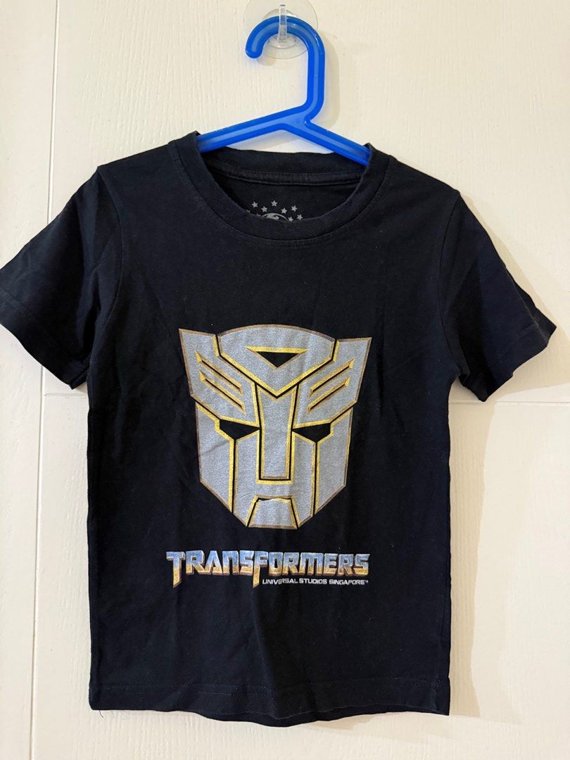 Black Transformers Universal Studios Singapore T-shirt (Category: Babies & Kids Fashion) located in Pasig City. Submitted by rl1617 (Listing ID 1442875270, Image 1). Description: Cool black Transformers t-shirt with Universal Studios Singapore logo. Short sleeves, comfy fit. 3-5 years old depending on the body frame size small Hi mamas! Cleaning out my child’s closet to make space. Most of these items were either worn once for photos or never wor