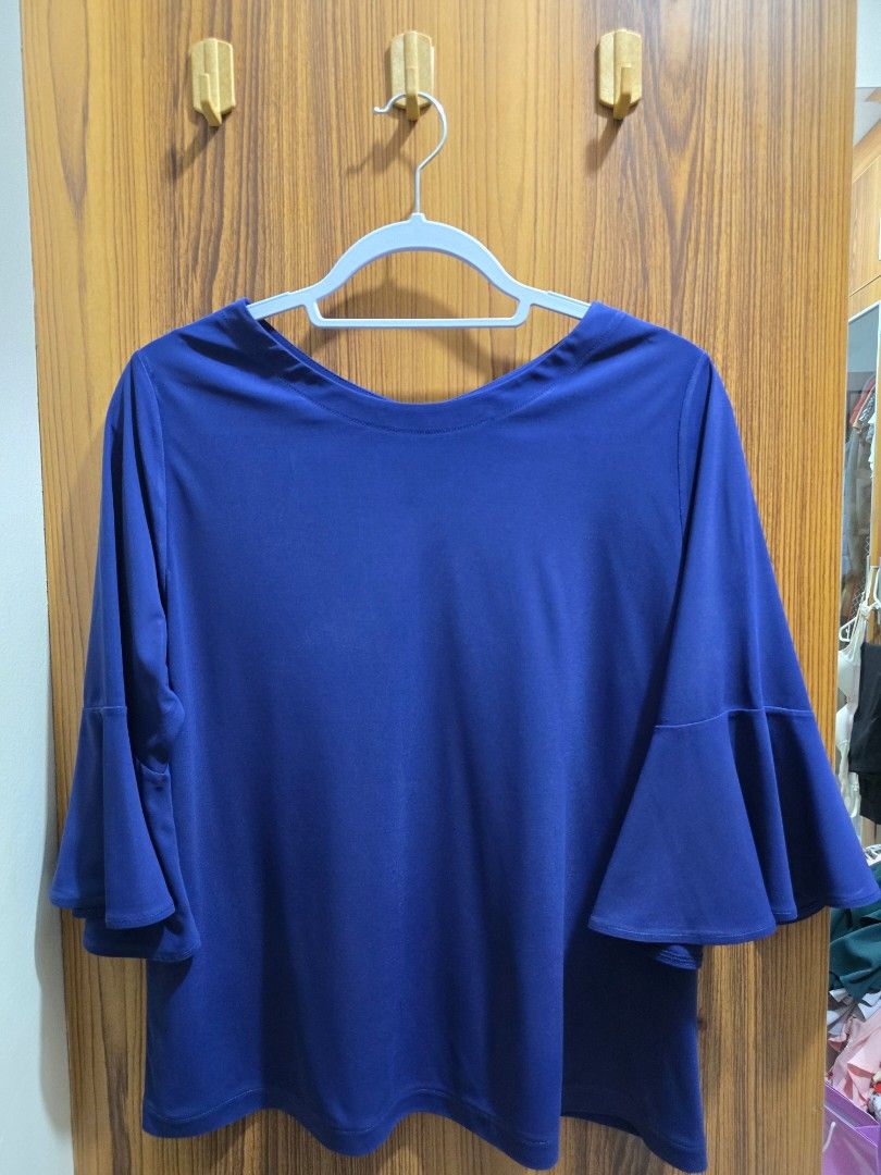 Blue Bell Sleeve Top (Category: Blouses) located in Valenzuela. Submitted by SecondChances (Listing ID 1442818086, Image 1). Description: - Stylish blue top - Features trendy bell sleeves - Flattering V-neckline - Made from comfortable fabric - Perfect for casual outings or dressing up - Effortlessly pairs with jeans or skirts - Designed for a flattering fit measurement in inches : shoulder - 15.5 armhole - 19 sleeves - 16 chest - 20.5 length - 2