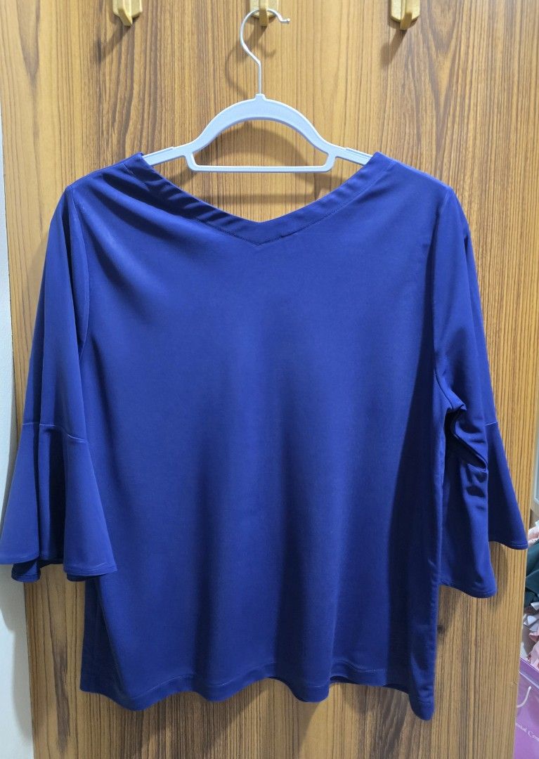Blue Bell Sleeve Top (Category: Blouses) located in Valenzuela. Submitted by SecondChances (Listing ID 1442818086, Image 2). Description: - Stylish blue top - Features trendy bell sleeves - Flattering V-neckline - Made from comfortable fabric - Perfect for casual outings or dressing up - Effortlessly pairs with jeans or skirts - Designed for a flattering fit measurement in inches : shoulder - 15.5 armhole - 19 sleeves - 16 chest - 20.5 length - 2