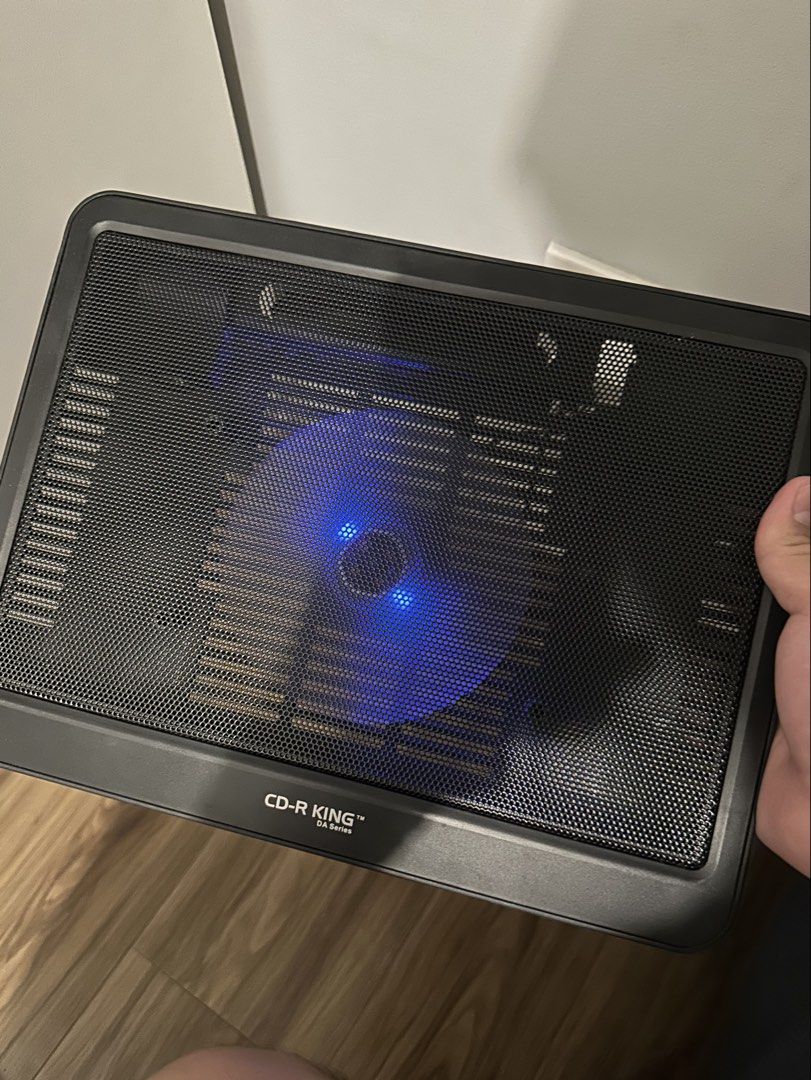 CD-R KING Laptop Cooler 1 Fan (Category: Other Mobile & Gadget Accessories) located in Taguig. Submitted by katandfrance (Listing ID 1442899439, Image 2). Description: - USB-powered laptop cooling pad - Built-in fan with blue LED light - Includes USB cable for easy connection - Prevents laptop overheating during long sessions - Works well and keeps your device cool.