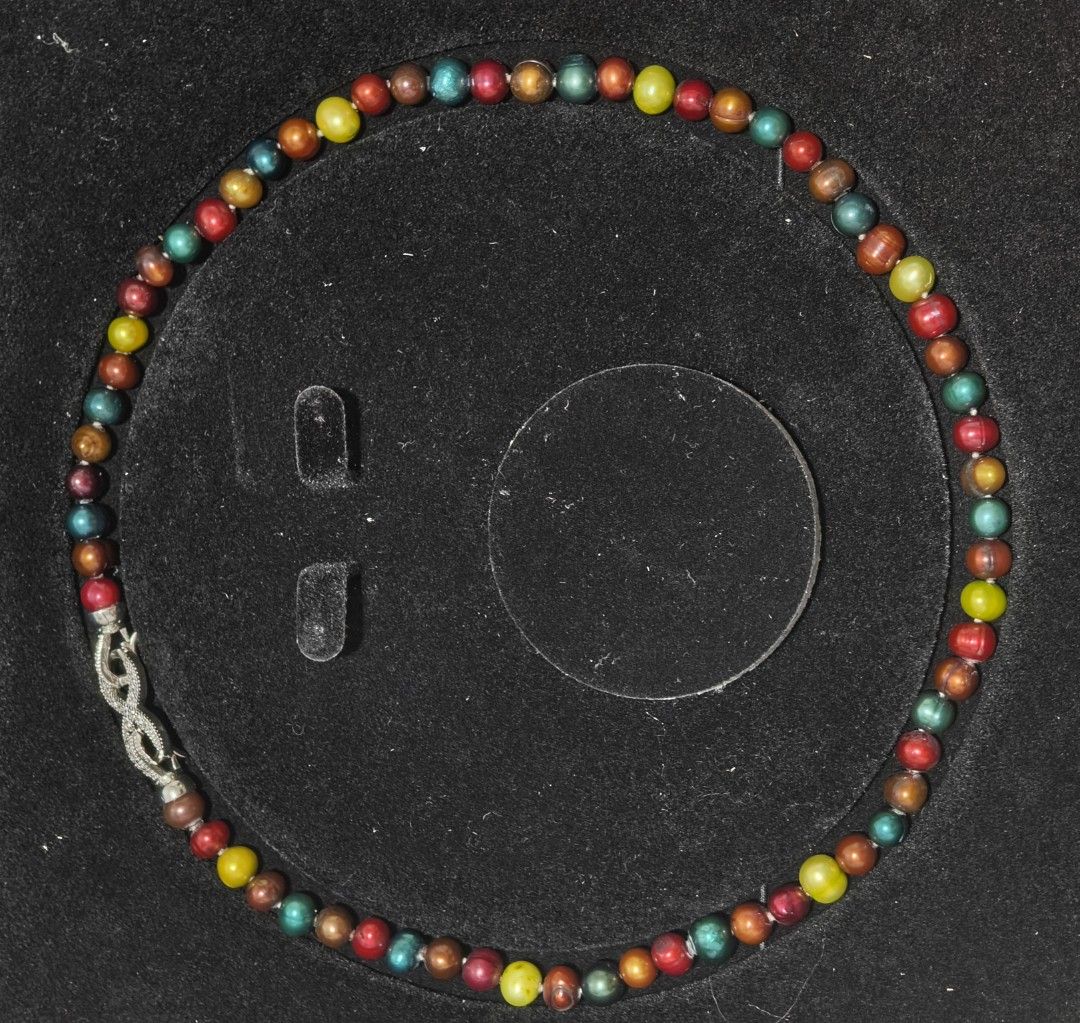 Colorful Pearl Necklace with Silver Clasp (Category: Necklaces) located in Batangas. Submitted by decluttering_bliss (Listing ID 1442841918, Image 1). Description: - Colorful fresh water pearls - Silver-toned clasp. - Simple and casual design. - Adds a pop of color to any outfit..