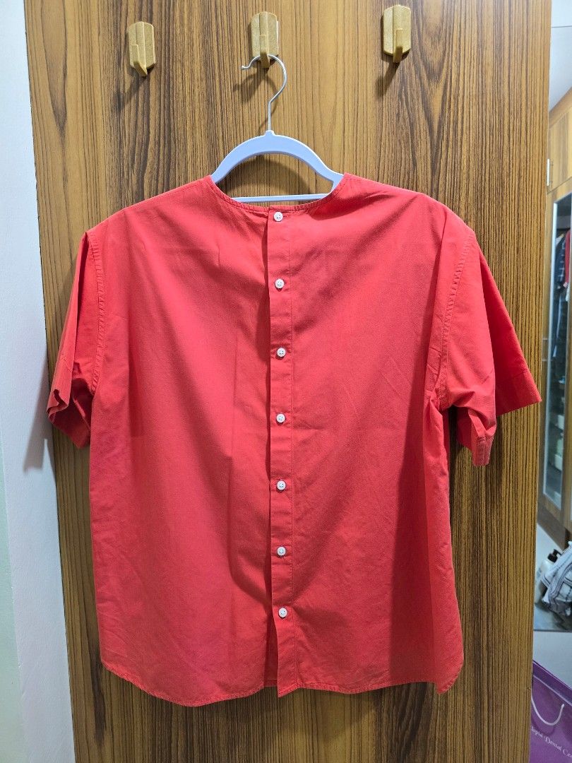 Coral Button-Up Shirt (Category: Shirts) located in Valenzuela. Submitted by SecondChances (Listing ID 1442815462, Image 2). Description: - Coral button-up shirt - Short sleeves - Standard fit - Ideal for casual wear or layering - Simple, versatile design - Pairs well with jeans or shorts measurements (in inches) : shoulder - 17.5 armhole - 16 sleeves - 8 chest - 18.5 length - 22.