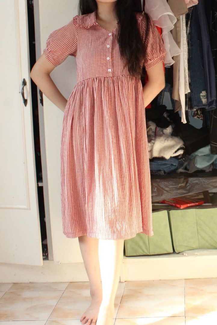 Cottagecore // Gingham Puff Sleeve Midi Dress (Category: Dresses) located in Mapandan. Submitted by olibski (Listing ID 1442830566, Image 2). Description: The dress is in my hometown, will send more pics once I get home - Adorable red and white gingham pattern - Features cute puff sleeves - Convenient button-up front - Flattering midi length with a flowy skirt - Ideal for casual outings, picnics, and everyday wear - Effortless to style and comfor