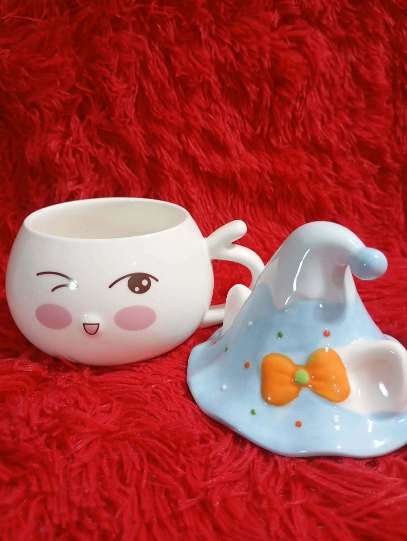 Cute Ceramic Mug with Lid (Category: Coffee & Tea Tableware) located in Caloocan City. Submitted by letsyrk (Listing ID 1442805823, Image 2). Description: - Adorable ceramic mugs with matching lids. - Available designs: Blue ombre dolphin, brown bear, raccoon, light blue blob, Christmas cat. - Ideal for coffee, tea, or hot chocolate. - Makes a great gift or a fun addition to your kitchen. - Each mug features a unique, playful design..