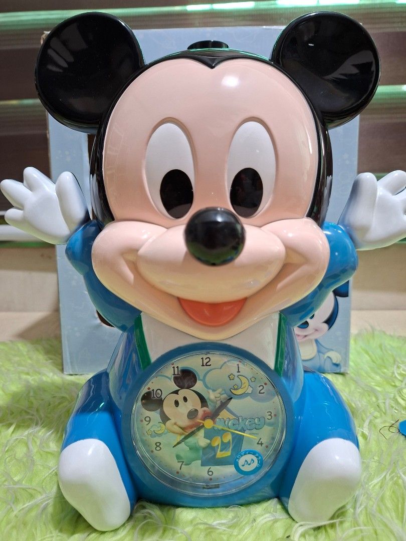 Disney Baby Mickey Mouse 3D Clock Alarm (Category: Clocks) located in Manila. Submitted by happywindmarlyn (Listing ID 1442808901, Image 2). Description: - Super cute Disney Baby Mickey Mouse 3D clock - Functions as an alarm clock - Features Mickey Mouse in his classic pose - Ideal for a nursery or a Disney fan's room.