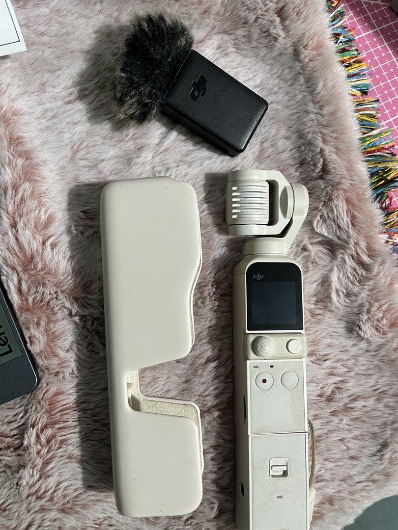 DJI Osmo Pocket 2 Creator Combo Sunset White (Category: Video Cameras) located in Manila. Submitted by kimmybears81925 (Listing ID 1442809404, Image 1). Description: Osmo Pocket 2 Creator Combo Sunset White (Limited Edition) Inclusions: Box, DJI Mic, Holder, Case Asking Price: 15,000 (Negotiable) No Issue, RFS: Need Funds Can Swap to Osmo Pocket 3 Standard or Insta360 Ace.