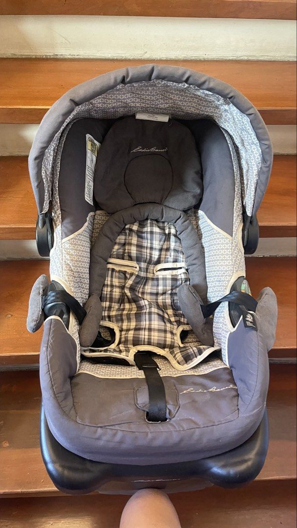 Eddie Bauer Infant Car Seat with Base (Category: Car Seats) located in Manila. Submitted by reinaplaza (Listing ID 1442737867, Image 3). Description: - Eddie Bauer infant car seat - Includes base - Stylish gray and plaid design - Convenient carrying handle - Safety harness included - Perfect for your little one.