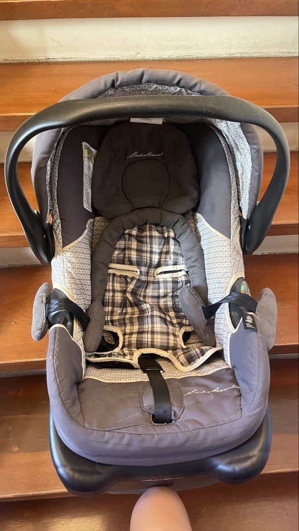 Eddie Bauer Infant Car Seat with Base (Category: Car Seats) located in Manila. Submitted by reinaplaza (Listing ID 1442737867, Image 2). Description: - Eddie Bauer infant car seat - Includes base - Stylish gray and plaid design - Convenient carrying handle - Safety harness included - Perfect for your little one.