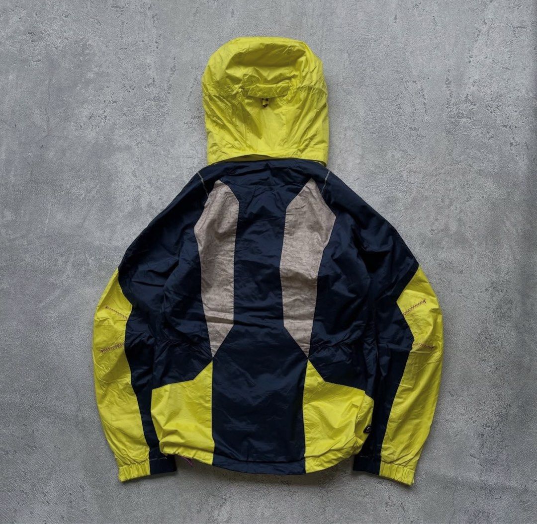 Eider technical shell jacket (Category: Coats, Jackets and Outerwear) located in Singapore. Submitted by sosleepyy (Listing ID 1442742947, Image 3). Description: * Technical waterproof shell * Pit/chest pocket * Adjustable hood * Alpine/mountaineering style cut * Bright yellow/black colorway.