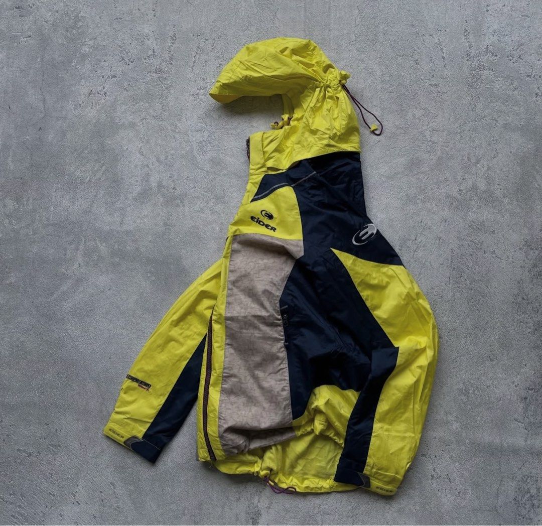 Eider technical shell jacket (Category: Coats, Jackets and Outerwear) located in Singapore. Submitted by sosleepyy (Listing ID 1442742947, Image 2). Description: * Technical waterproof shell * Pit/chest pocket * Adjustable hood * Alpine/mountaineering style cut * Bright yellow/black colorway.