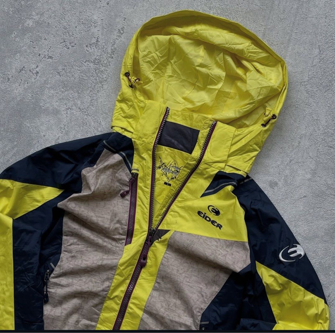 Eider technical shell jacket (Category: Coats, Jackets and Outerwear) located in Singapore. Submitted by sosleepyy (Listing ID 1442742947, Image 8). Description: (L 60 x W 48) * Technical waterproof shell * Pit/chest pocket * Adjustable hood * Alpine/mountaineering style cut * Bright yellow/black colorway.