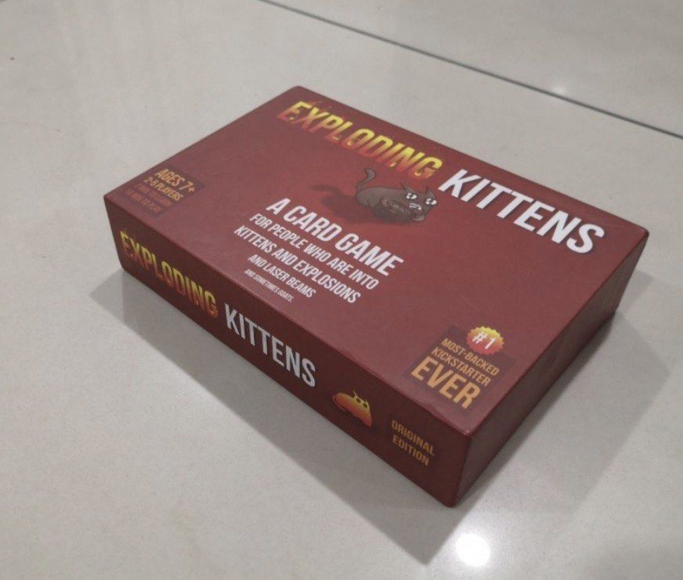 Exploding kittens (Category: Toys & Games) located in Kuala Lumpur. Submitted by dayventhe13yo2026 (Listing ID 1442838707, Image 3). Description: Includes all 3 of the Exploding Kittens. Imploding kittens, exploding kittens and exploding kittens (NSFW Deck) Will receive in 1+ days. No delivery on Sundays. Delivery only..