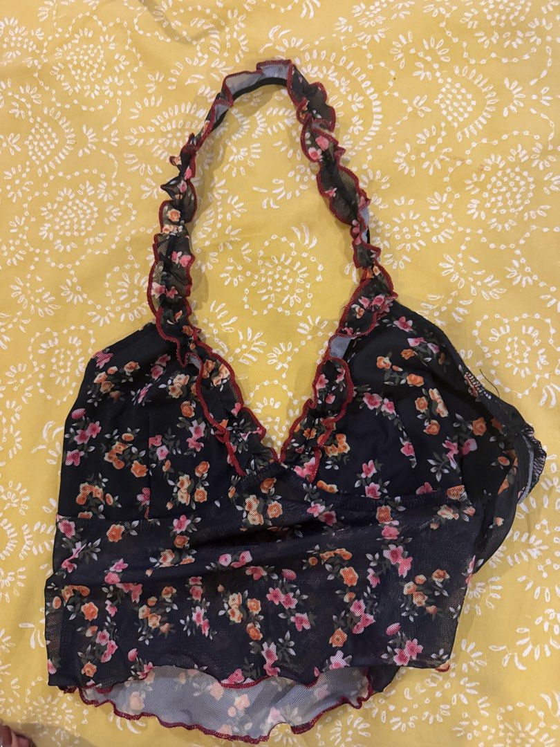 Floral Mesh Halter Top with Ruffle Trim (Category: Sleeveless) located in Paranaque City. Submitted by bbbcloset (Listing ID 1442848790, Image 3). Description: - Cute black mesh halter top - Pretty floral print (pink & orange flowers) - Ruffled trim on neckline & straps - Cropped length - Versatile: pairs well with jeans or skirts - Ideal for night outs or casual days.