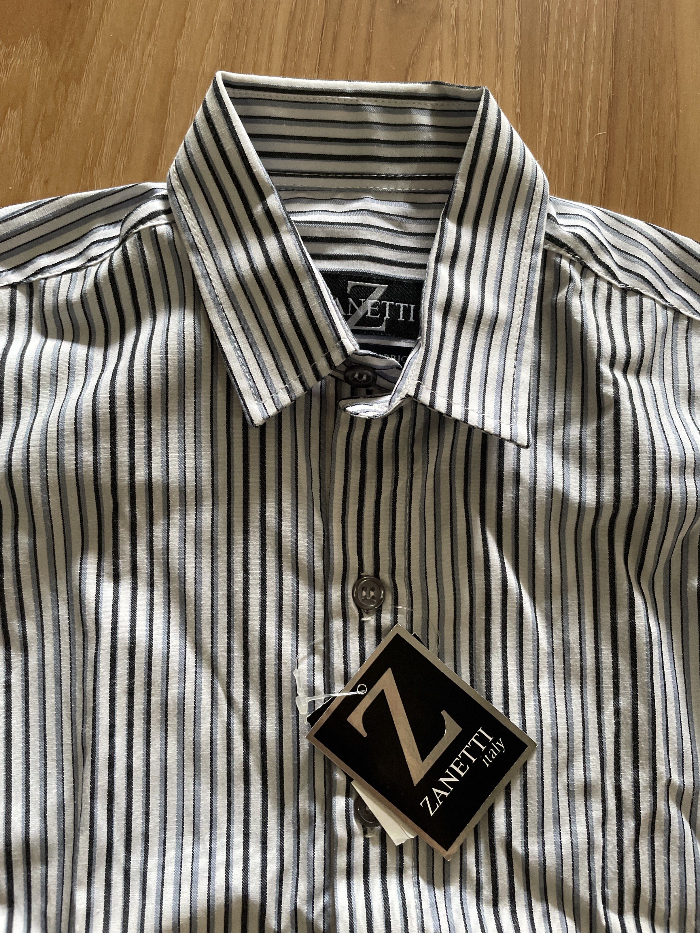 Formal Polo for Kids Boys (Category: Babies & Kids Fashion) located in San Juan City. Submitted by tabithajam (Listing ID 1442766900, Image 1). Description: - Zanetti Italy Shirt - Classic black and white vertical stripes - Premium quality fabric - Button-up style - Long sleeves with button cuffs Ideal for boys 6-7 y.o Bought for P900 Shipping c/o buyer Greenhills San Juan .
