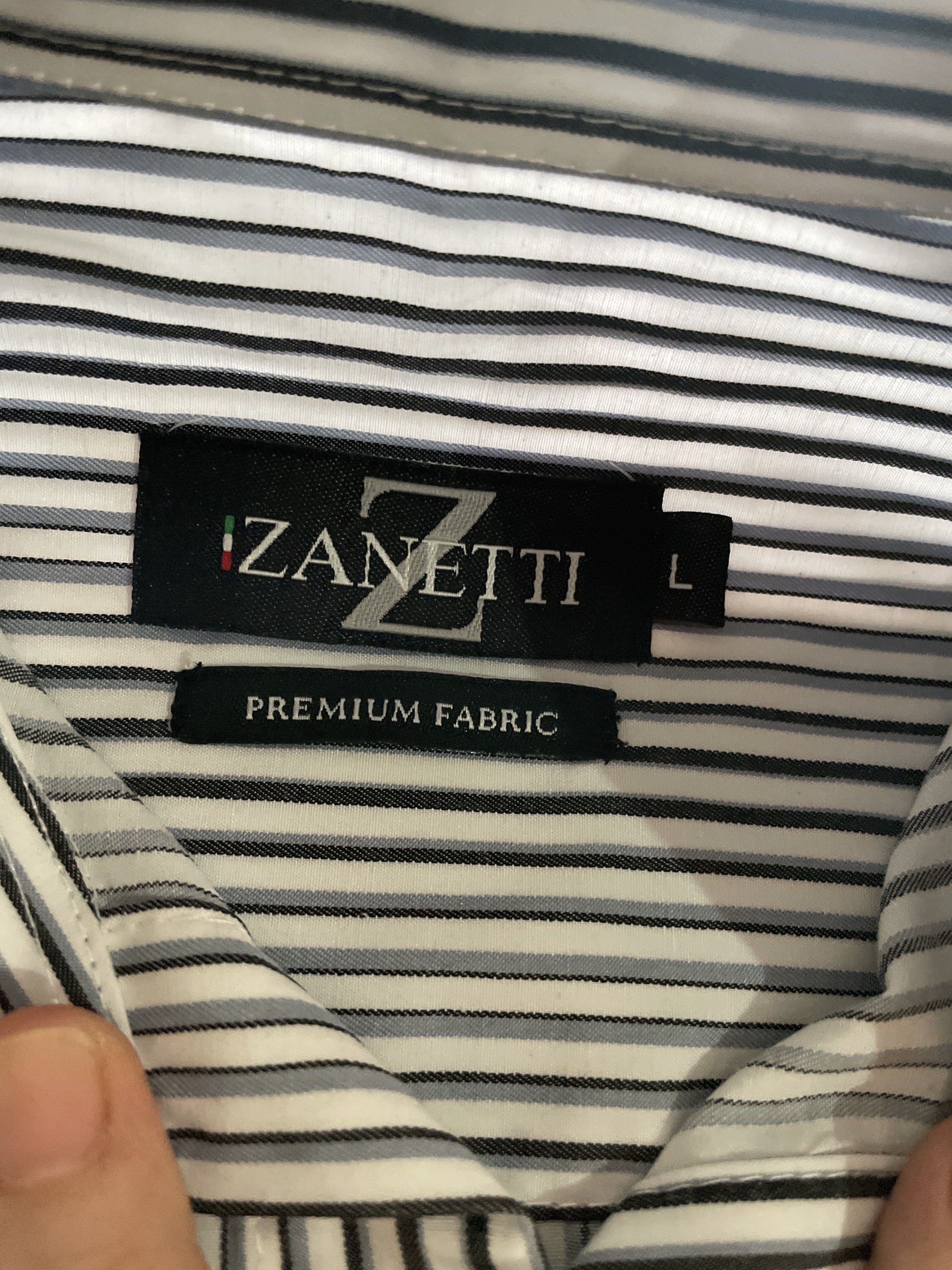 Formal Polo for Kids Boys (Category: Babies & Kids Fashion) located in San Juan City. Submitted by tabithajam (Listing ID 1442766900, Image 3). Description: - Zanetti Italy Shirt - Classic black and white vertical stripes - Premium quality fabric - Button-up style - Long sleeves with button cuffs Ideal for boys 6-7 y.o Bought for P900 Shipping c/o buyer Greenhills San Juan .