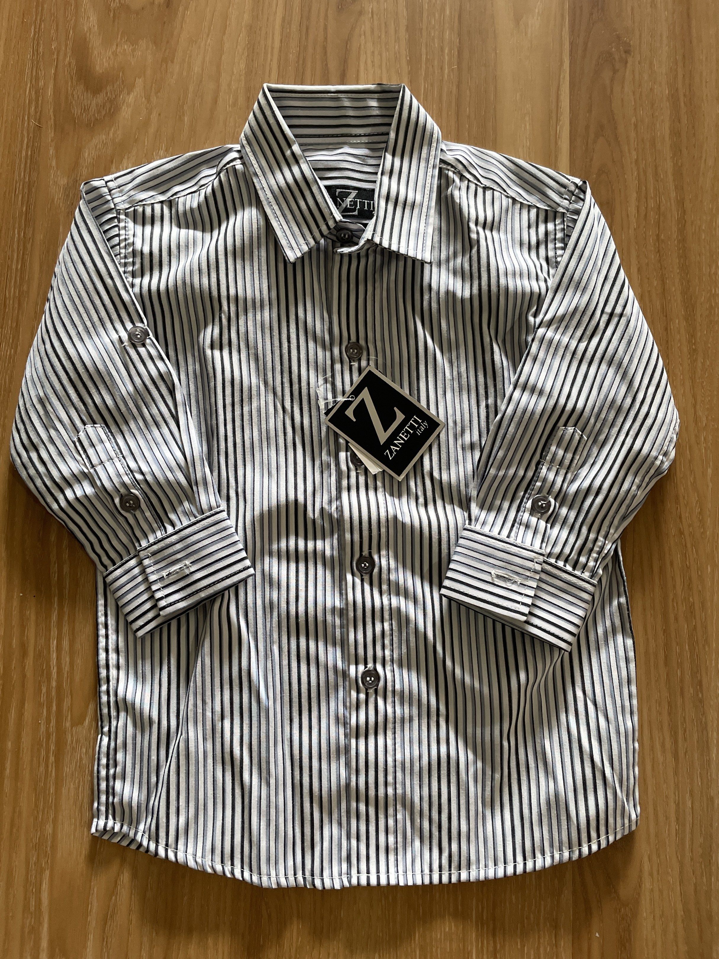 Formal Polo for Kids Boys (Category: Babies & Kids Fashion) located in San Juan City. Submitted by tabithajam (Listing ID 1442766900, Image 2). Description: - Zanetti Italy Shirt - Classic black and white vertical stripes - Premium quality fabric - Button-up style - Long sleeves with button cuffs Ideal for boys 6-7 y.o Bought for P900 Shipping c/o buyer Greenhills San Juan .