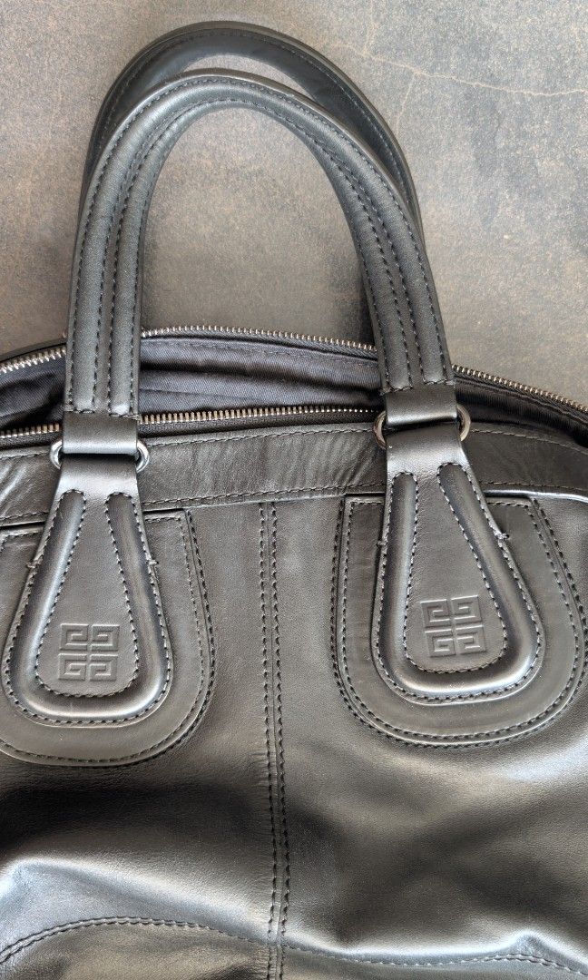 Givenchy Black Leather Nightingale Bag (Category: Luxury Bags & Wallets) located in Manila. Submitted by cappinjay (Listing ID 1442810376, Image 2). Description: 100% authentic Givenchy Large Nightingale Satchel in smooth black cowhide leather. Bought in Tokyo, Japan in 2010. Exact Tape Measurements (Laid Flat): Base Width: ~44–45 cm (flares out to 50+ cm at the mid-body when flat) Height (Base to Zipper): ~36–37 cm Note: This is the true Large/T