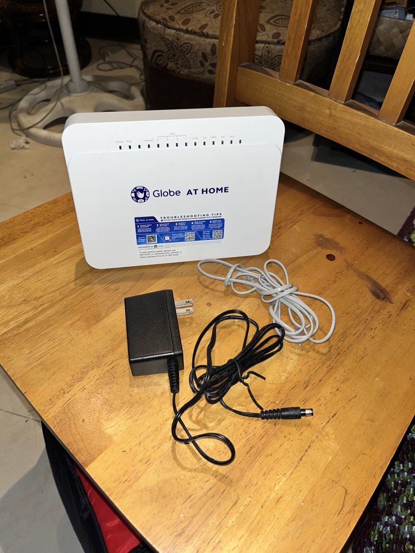 Globe At Home WiFi Modem Router (Category: Networking) located in Bulacan. Submitted by ninerose (Listing ID 1442754689, Image 3). Description: - Open for offers 🤩 - Globe At Home WiFi modem - Includes power adapter and cable - Bigay langgg never got to connect sa WiFi pero working!! .