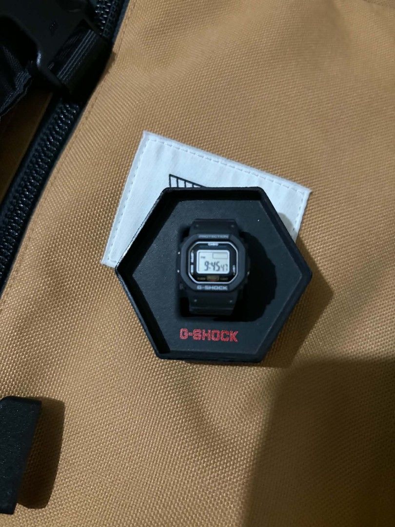 Gshock DWN-5600 Nano Watch (Category: Men's Watches) located in Quezon City. Submitted by repeat.peach (Listing ID 1442783164, Image 3). Description: Almost new *Used only once or twice *Comes with warranty card, box and paper bag.