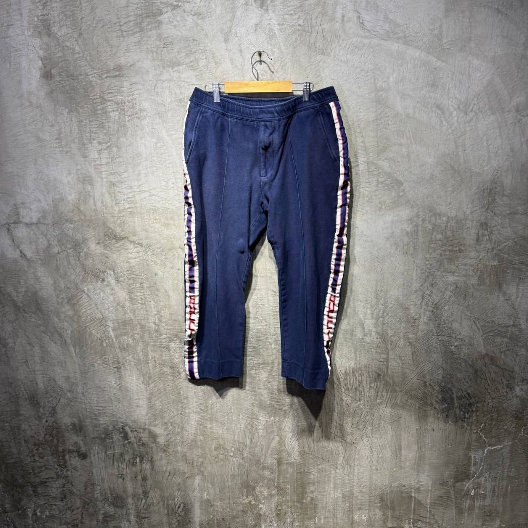 Gucci Stripe logo Jogger pants (Category: Luxury Apparel) located in Quezon City. Submitted by johnpaulperezzz (Listing ID 1442806602, Image 1). Description: NAME: Gucci Stripe logo Jogger pants COLOR: Blue SIZE: 46 FIT: 32 Dimension: Waist: 15-17 Inseam: 22 Front Rise: 11 Thigh: 9 Knee: 7 Leg Opening: 7 CONDITION: 8.5/10 ISSUE: -side tape needs ironing PRICE: 9k .