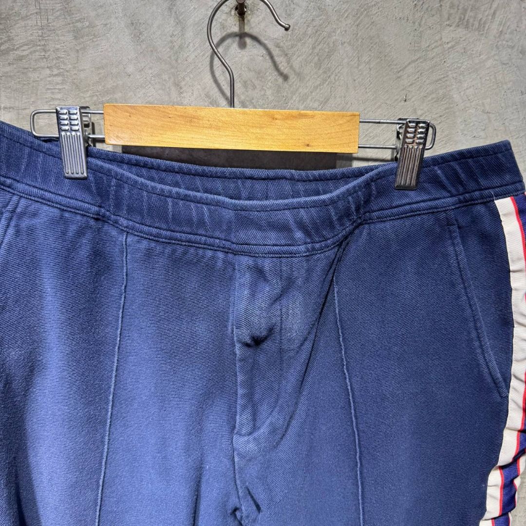 Gucci Stripe logo Jogger pants (Category: Luxury Apparel) located in Quezon City. Submitted by johnpaulperezzz (Listing ID 1442806602, Image 2). Description: NAME: Gucci Stripe logo Jogger pants COLOR: Blue SIZE: 46 FIT: 32 Dimension: Waist: 15-17 Inseam: 22 Front Rise: 11 Thigh: 9 Knee: 7 Leg Opening: 7 CONDITION: 8.5/10 ISSUE: -side tape needs ironing PRICE: 9k .