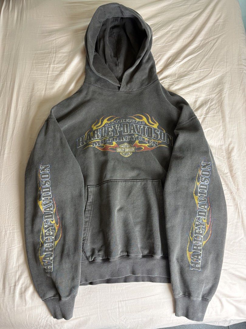 Harley-Davidson "Archive" Flame Print Hoodie (Category: Coats, Jackets and Outerwear) located in Binan City. Submitted by micosarchive (Listing ID 1442863271, Image 1). Description: - Grey Harley-Davidson hoodie - Flame graphics on sleeves and chest - "Archive" tag detail - Pullover style - Front pocket - Comfortable and classic design -25x27.