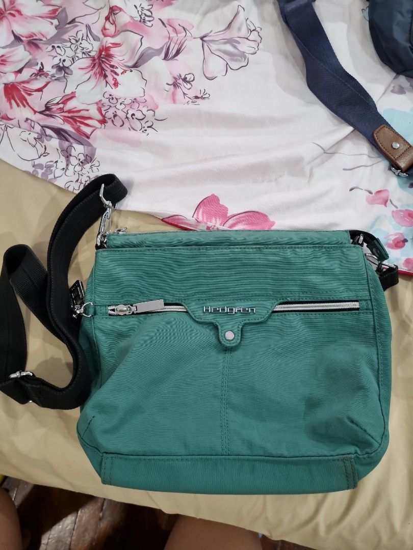 Hedgren Green Nylon Crossbody Bag (Category: Cross-body Bags) located in Manila. Submitted by brufis (Listing ID 1442783688, Image 1). Description: - Brand: Hedgren - Color: Green - Material: Nylon - Features: Front zipper pocket, adjustable strap - Ideal for: Everyday essentials - Condition: Clean and ready for a new owner.