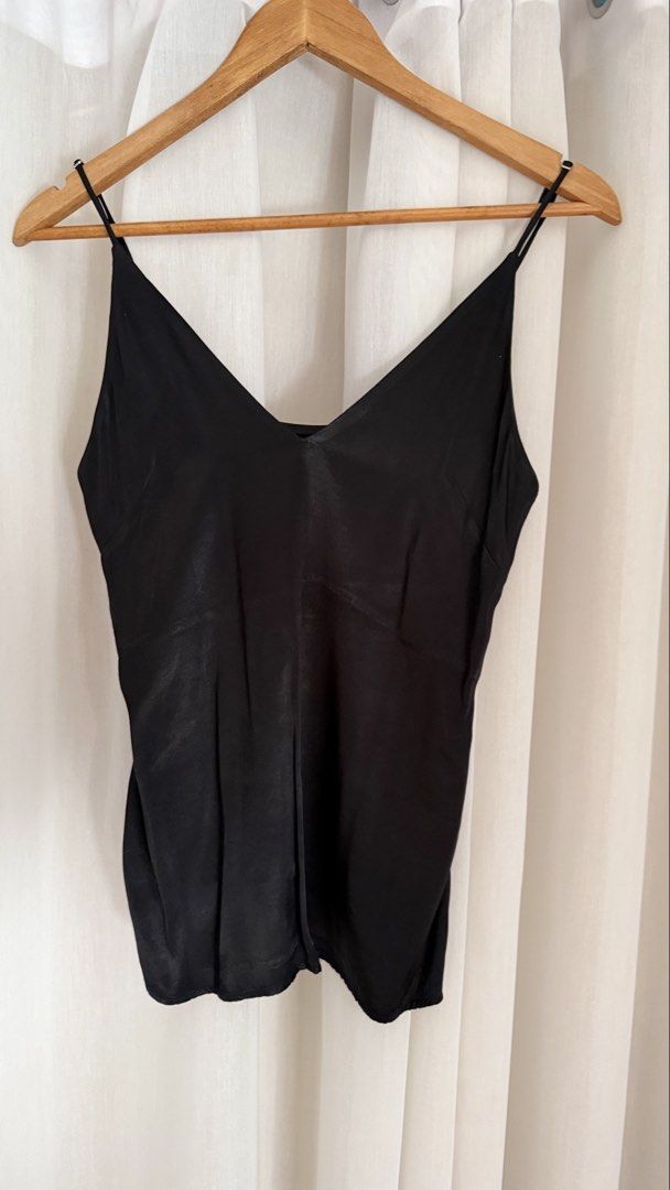 H&M Black Silk Camisole Top (Category: Sleeveless) located in Makati City. Submitted by victoriatrishaa (Listing ID 1442792073, Image 1). Description: Black silk camisole from H&M. Adjustable spaghetti straps. L: 24.5 W: 14”.