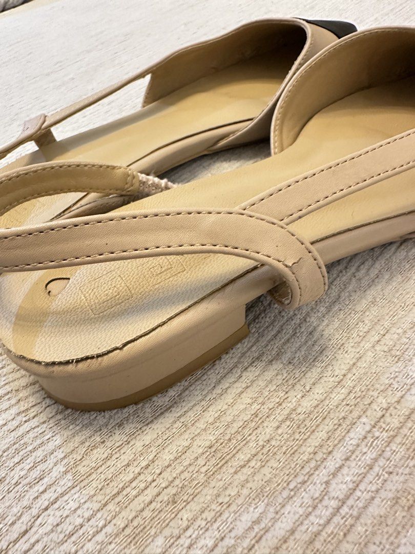Hue Beige Slingback Flats with Black Cap Toe (US 9) (Category: Flats & Sandals) located in Paranaque City. Submitted by seriousshopper678 (Listing ID 1442810980, Image 3). Description: - Cute beige slingback flats - Black cap toe detail - Elasticated straps for a comfortable fit - Minor signs of wear on insoles and heel edges -small cracks on strap & light peeling in inner shoes - Ideal for everyday wear Shipping c/o buyer through Lalamove or gra