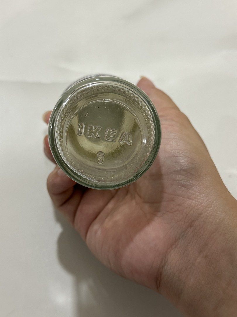 IKEA Glass Jar with Metal Lid (Category: Food Organization & Storage) located in Manila. Submitted by tenshiii185 (Listing ID 1442821597, Image 2). Description: IKEA small glass jar with frosted band and brushed metal lid. Perfect for spices, beads, or craft supplies. IKEA logo on bottom. Clean..