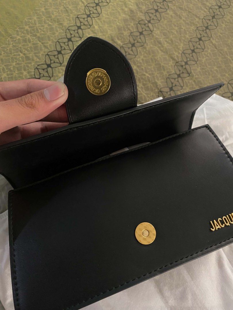 Jacquemus Le Chiquito Bag Black (Category: Luxury Bags & Wallets) located in Manila. Submitted by ixandrei5614161 (Listing ID 1442882938, Image 3). Description: - Black Jacquemus Bag - Leather Material - Versatile: Top handle and adjustable shoulder strap - Secure Magnetic Closure - Elegant Gold Hardware Details - Comes with Original Dust Bag and Packaging - Ideal for evening events or adding a stylish flair to your everyday outfits.