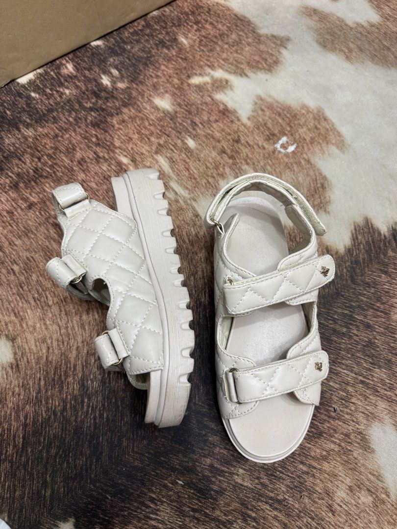 Jelly Bunny Cream Quilted Strap Platform Sandals (Category: Flats & Sandals) located in Bacoor. Submitted by goodmorningalvea (Listing ID 1442780462, Image 2). Description: - Cream quilted sandals - Velcro straps for easy adjustment - Comfortable platform sole - Easy to put on and take off - Ideal for casual wear Rfs: not my style anymore.