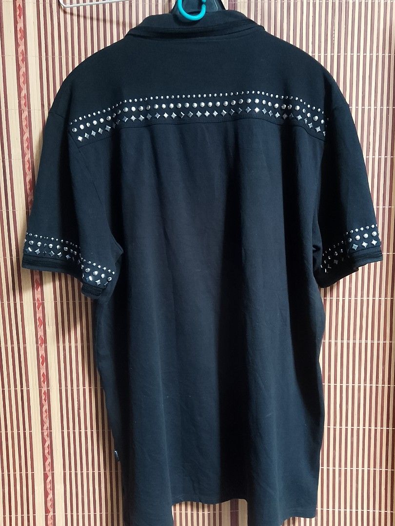 Just Cavalli Studded polo shirt (Category: Luxury Apparel) located in Manila. Submitted by hoard_up (Listing ID 1442872056, Image 2). Description: Authentic Just Cavalli Studded Polo Shirt.🔥 🏷️2XL on tag. ▫️Actual dimes:‼️ Width" 23 Length" 27 Like new condition. Flawless. Complete Stud. Made with stainless material. 🏷️Selling for 2,500 plus sf. 🚚💵Gcash x Jnt. 📍Pampanga. Dm.📩📩📩.