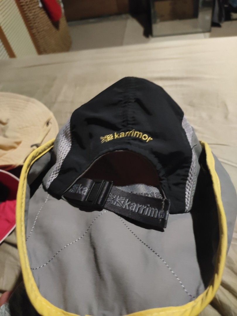 Karrimor Bucket Hat Sun Hat Outdoor (Category: Caps & Hats) located in Pasig City. Submitted by theloadout. (Listing ID 1442772280, Image 2). Description: - Karrimor bucket hat - Ideal for outdoor activities - Adjustable drawstring for a custom fit - Adjustable strap at the back - Breathable material, perfect for hot weather - Wide brim for excellent sun protection - Stylish yellow trim detail.