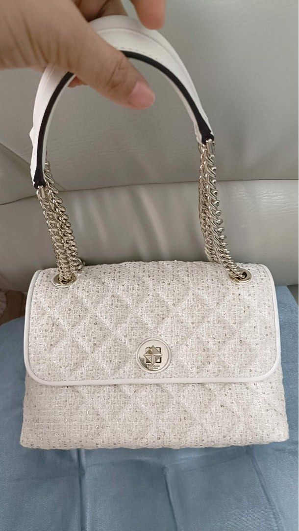 Kate Spade Tweed Shoulder Bag with Chain Strap (Category: Luxury Bags & Wallets) located in Cabanatuan. Submitted by sha_1984 (Listing ID 1442801990, Image 3). Description: - White tweed shoulder bag by Kate Spade - Quilted pattern with subtle sparkle - Secure turn-lock closure - Interior features signature spade pattern lining - Versatile for dressing up or down.