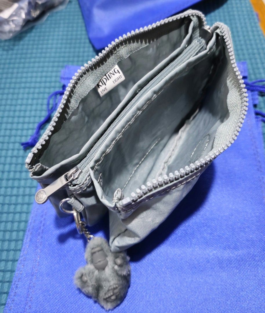 Kipling Creativity Large Pouch in Relaxed Gray (Category: Wallets & Card holders) located in Baguio. Submitted by catdeclutters (Listing ID 1442846000, Image 3). Description: Original BNWOT Lp + 65 sf J&T.