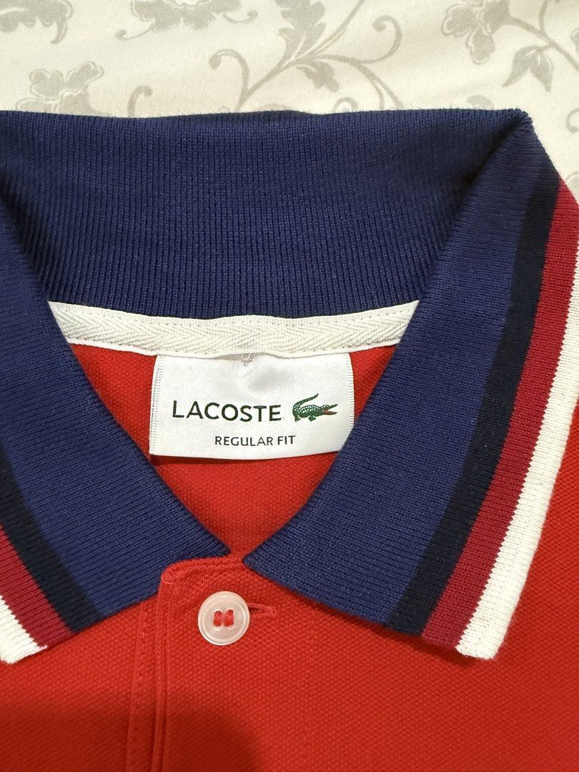 Lacoste Red Polo Shirt (Category: Tshirts & Polo Shirts ) located in Makati City. Submitted by decluttering822 (Listing ID 1442835391, Image 2). Description: Like new condition Slightly negotiable .