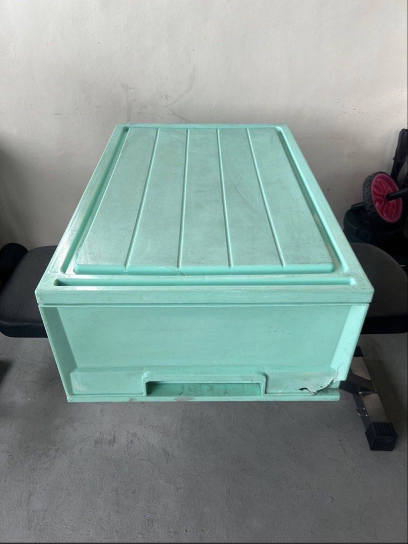 Light Green Plastic Storage Box with Lid (Category: Storage Boxes & Baskets) located in Quezon City. Submitted by cristintin (Listing ID 1442922104, Image 1). Description: - Large plastic storage box with lid - Light green color - Ideal for storing various items - Sturdy construction.