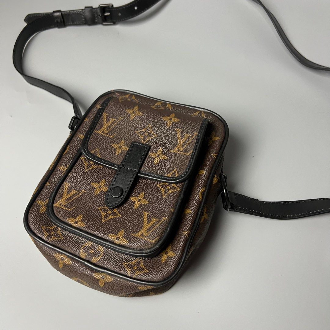 Louis Vuitton Monogram Canvas Crossbody Bag (Category: Luxury Bags & Wallets) located in Bago City. Submitted by g___shop (Listing ID 1442838234, Image 2). Description: - Classic Louis Vuitton monogram canvas crossbody bag - Black leather trim and adjustable strap - Front flap pocket with snap closure - Ideal for everyday use - Shows some signs of wear on leather trim and strap.