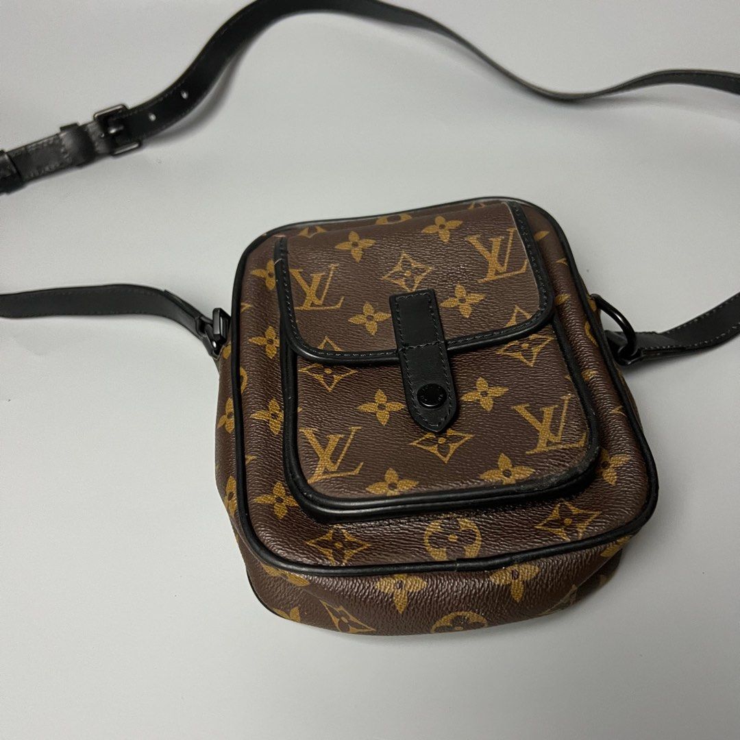 Louis Vuitton Monogram Canvas Crossbody Bag (Category: Luxury Bags & Wallets) located in Bago City. Submitted by g___shop (Listing ID 1442838234, Image 3). Description: - Classic Louis Vuitton monogram canvas crossbody bag - Black leather trim and adjustable strap - Front flap pocket with snap closure - Ideal for everyday use - Shows some signs of wear on leather trim and strap.