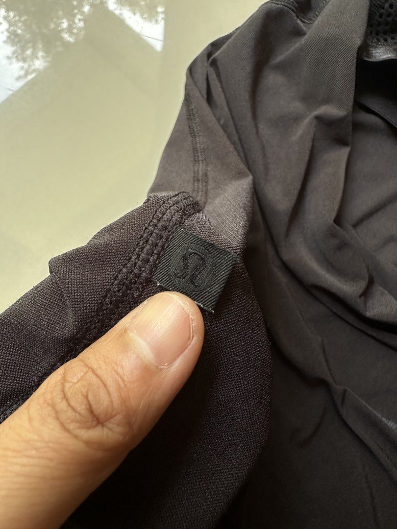 Lululemon Black Racerback Tank Top Size 2 (Category: Activewear) located in Rosales. Submitted by dariang22 (Listing ID 1442748078, Image 3). Description: - Lululemon black tank top - Racerback style - Mesh detailing on shoulders and upper back - Built-in bra support - Size: 2 - Ideal for workouts or casual wear.