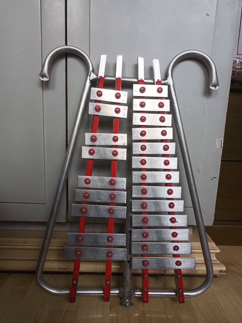 Lyre Xylophone (Silver) with beater (Category: Musical Instruments) located in Manila. Submitted by thriftyme24 (Listing ID 1442752836, Image 1). Description: -Good as new. Used only thrice for educational purposes. -With beater but no bag -Cons: It has a surname written on the back -Portable version of glockenspiel for marching bands or music subjects..