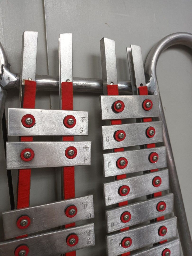 Lyre Xylophone (Silver) with beater (Category: Musical Instruments) located in Manila. Submitted by thriftyme24 (Listing ID 1442752836, Image 2). Description: -Good as new. Used only thrice for educational purposes. -With beater but no bag -Cons: It has a surname written on the back -Portable version of glockenspiel for marching bands or music subjects..